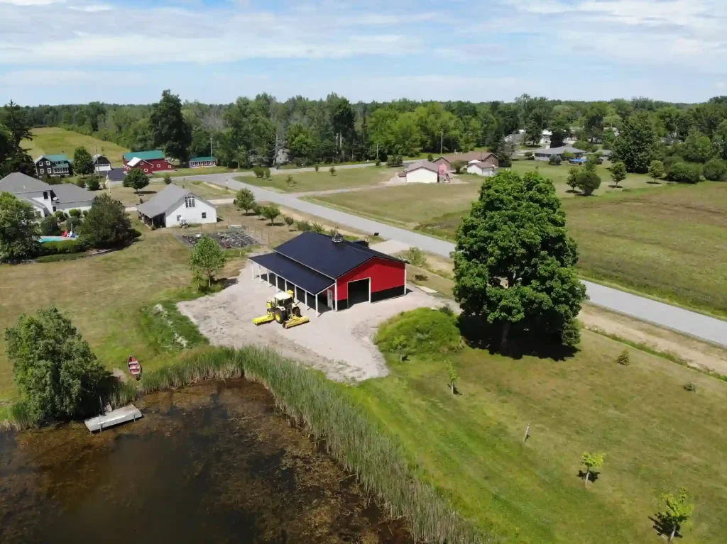 Red pole barn by Stately Post Frame in Clarence Center, NY.