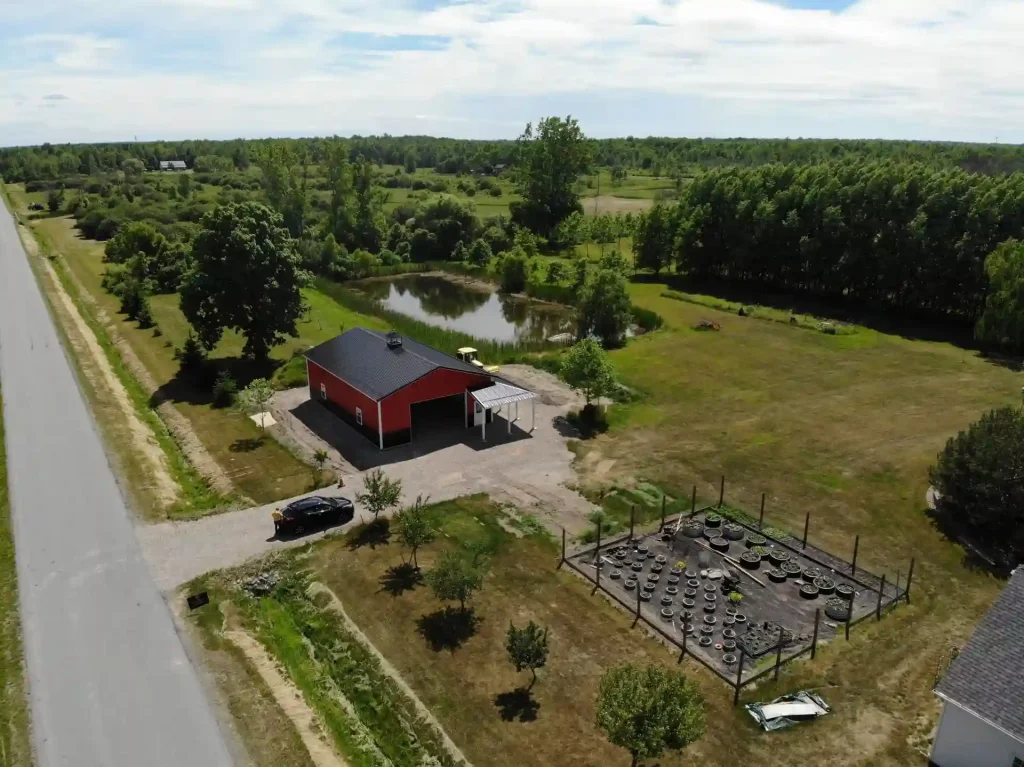 Red pole barn by Stately Post Frame in Clarence Center, NY.