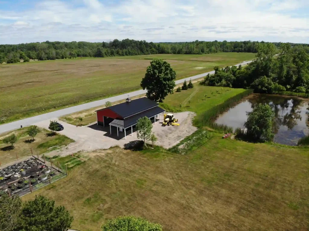 Red pole barn by Stately Post Frame in Clarence Center, NY.