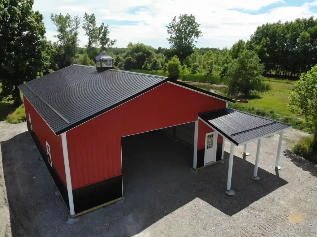 Red pole barn by Stately Post Frame in Clarence Center, NY.