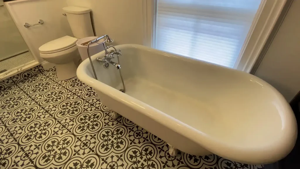 Clawfoot Tub. Retro and elegant style luxury bathroom remodel by Stately Kitchen and Bath in Lockport, NY.