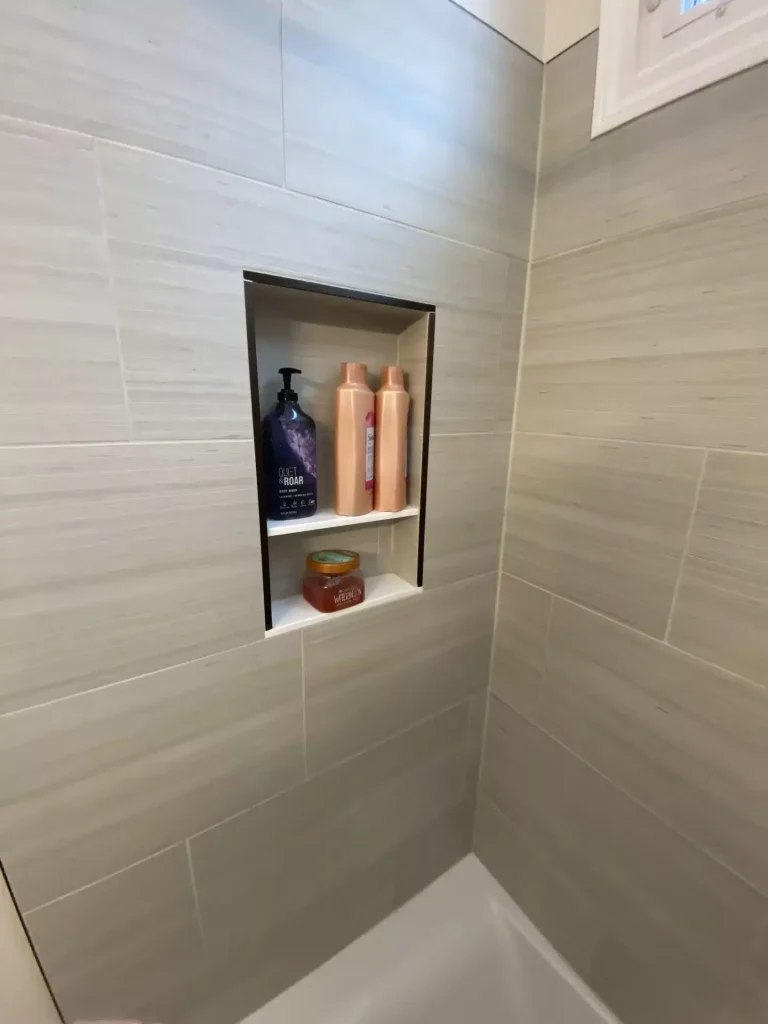 Custom shower niche. Second upstairs bathroom remodel in Clarence, NY by Stately Kitchen and Bath.