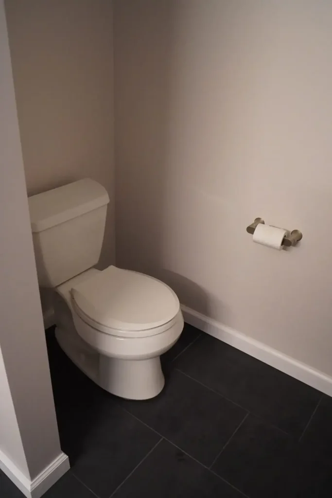 Toilet cubby. Master bathroom remodel in Clarence, NY by Stately Kitchen and Bath.