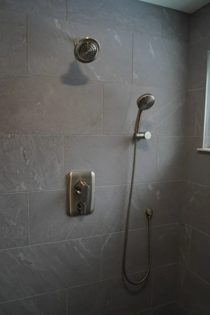 Shower and fixtures. Master bathroom remodel in Clarence, NY by Stately Kitchen and Bath.