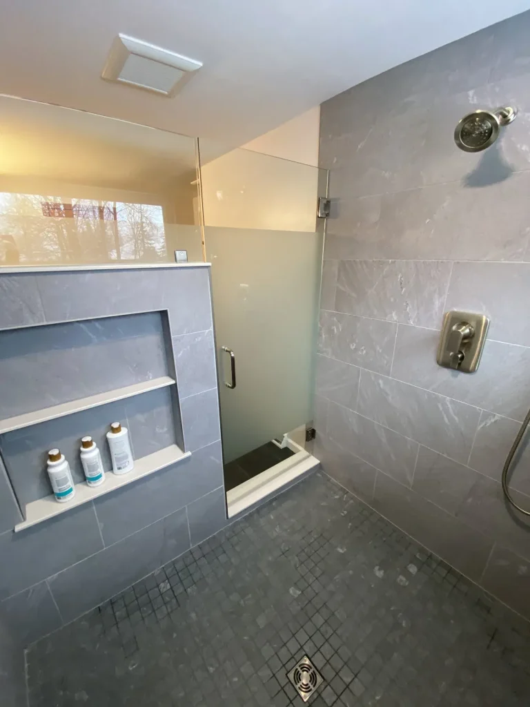 Large master shower. Master bathroom remodel in Clarence, NY by Stately Kitchen and Bath.