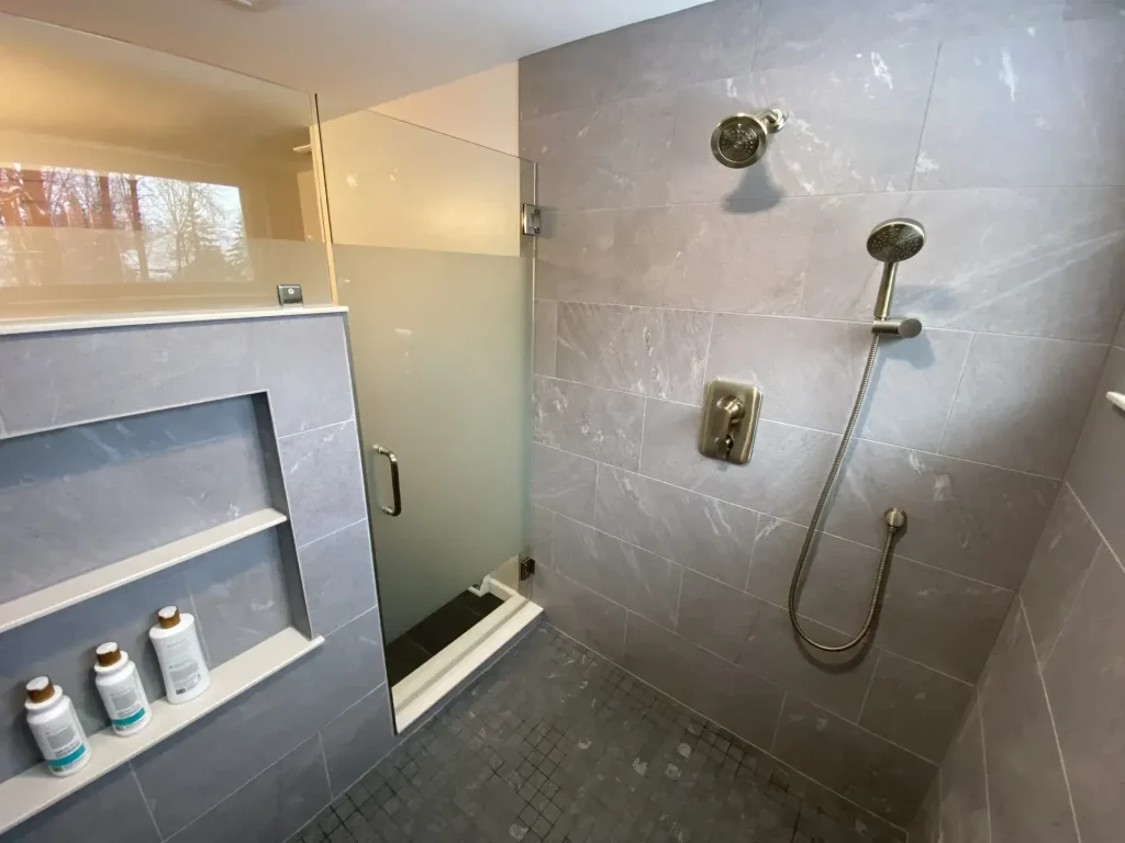 Large master shower. Master bathroom remodel in Clarence, NY by Stately Kitchen and Bath.