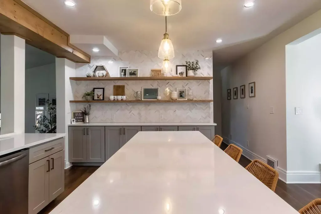 Island and custom cabinetry. Modern kitchen with natural elements by Stately Kitchen and Bath in Amherst, NY.