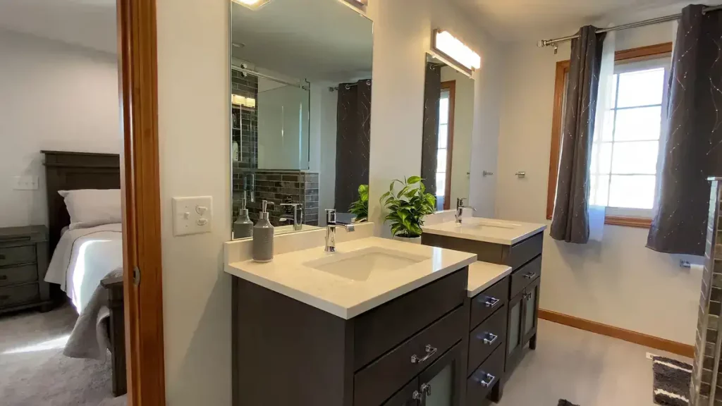 Modern vanity as part of a master bathroom addition by Stately General Contracting in Williamsville, NY.