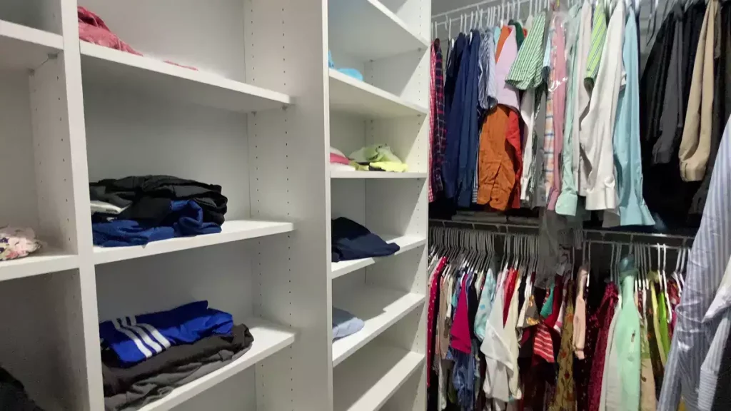 Walk-in closet organization installed by Stately General Contracting.