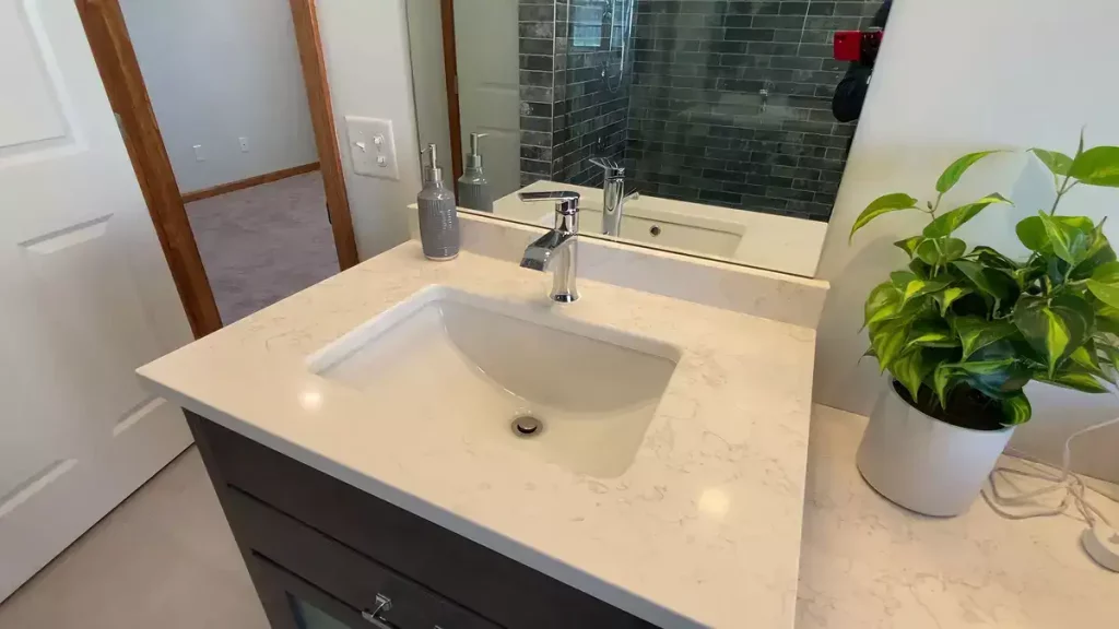 Modern vanity in a home addition by Stately General Contracting in Williamsville, NY.