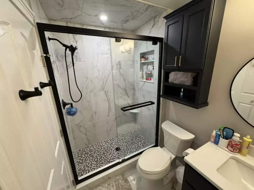 Secondary upstairs bathroom remodel by Stately Kitchen and Bath in Clarence, NY.