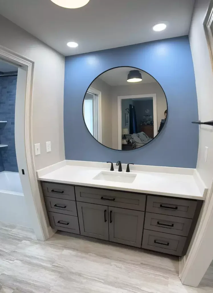 Vanity 1 of 2 in a shared bathroom remodeled by Stately Kitchen and Bath in Orchard park, NY.