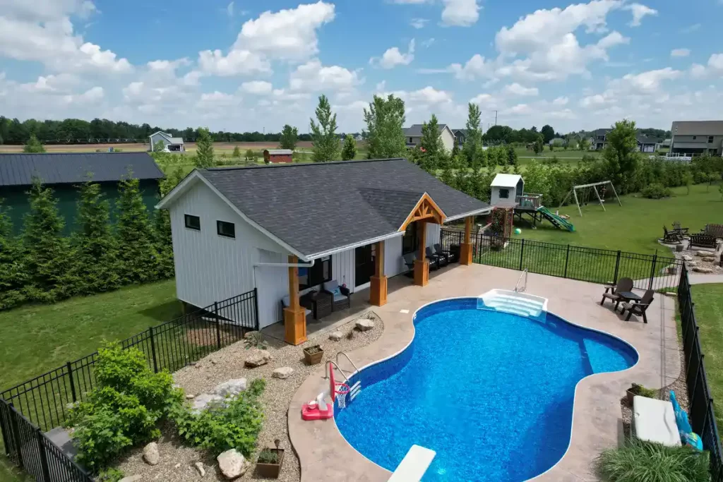 Aerial perspective of the pool house addition in Akron, NY, highlighting the pool area and custom millwork by Stately General Contracting.