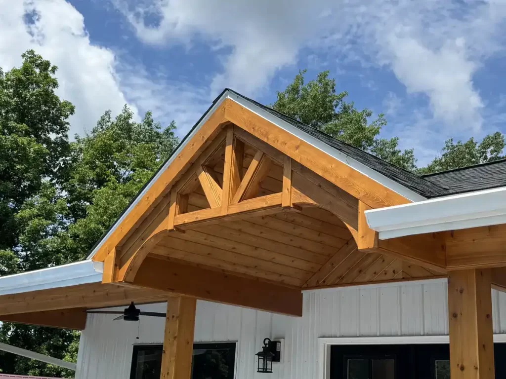 Close-up of the custom millwork on the overhang of the pool house addition in Akron, NY, crafted by Stately General Contracting.