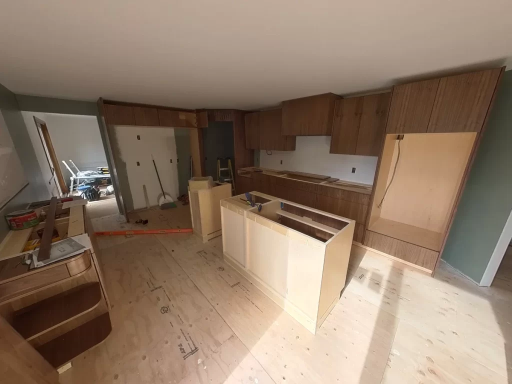 Progress on kitchen remodel with custom cabinetry installation by Stately Kitchen and Bath.