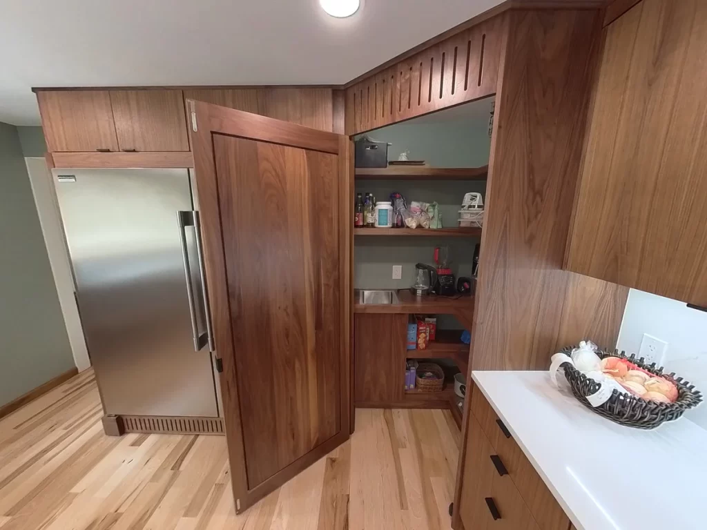 Newly installed spacious pantry in kitchen remodel by Stately Kitchen and Bath.