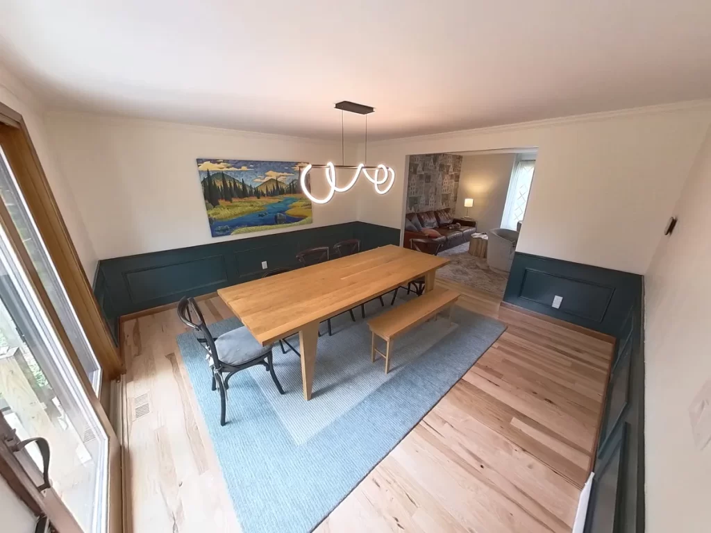 Remodeled kitchen by Stately Kitchen and Bath with island seating and custom cabinetry.