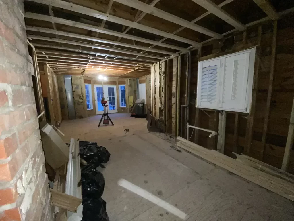 Progress of kitchen remodel in Amherst, NY, with framing and electrical wiring visible by Stately Kitchen and Bath.