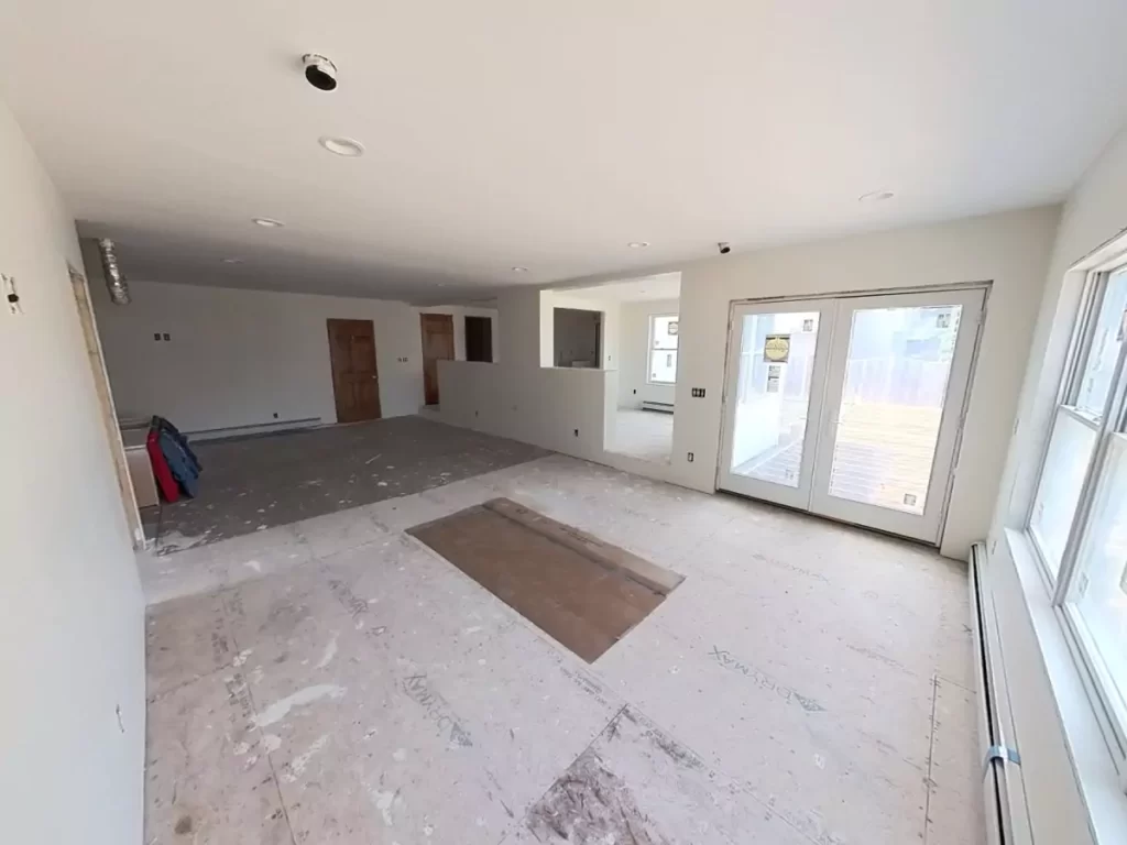 Drywall installation in progress for home addition in Amherst, NY by Stately, preparing spaces for finishing touches.