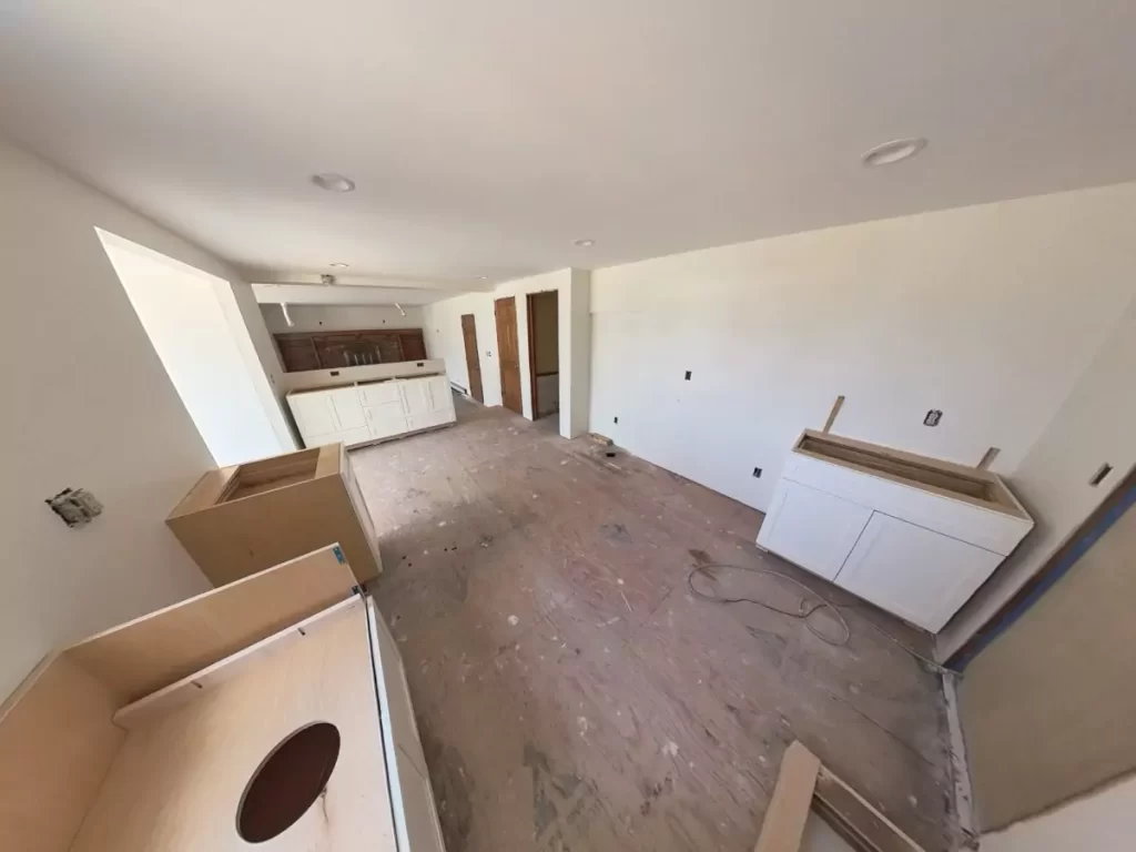 Living area drywall installed in home addition by Stately, Amherst, NY, creating clean lines and a ready-to-finish interior.