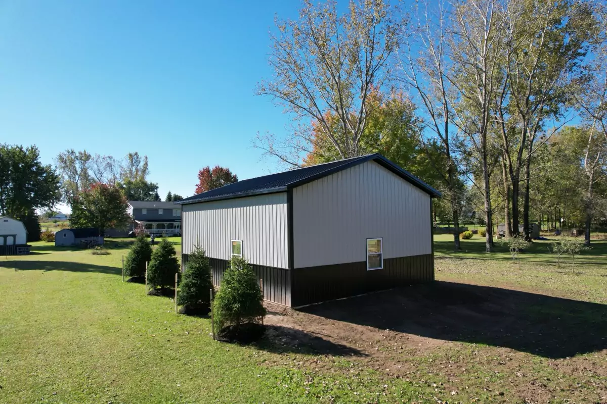 Angled view of Stately Pole Barn, highlighting clean lines and durable steel construction.