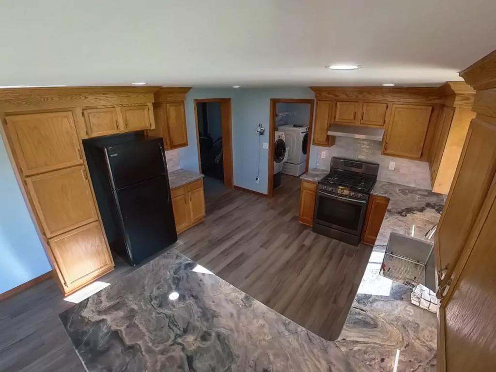 Overhead view of Stately’s Akron kitchen refresh with stone countertops and refreshed cabinetry.