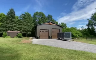 A stylish pole barn garage by Stately Builders in Lockport, NY.