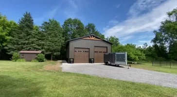 A stylish pole barn garage by Stately Builders in Lockport, NY.