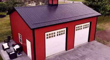 Red two car post frame pole barn garage in Clarence, NY. Constructed by Stately Post Frame.