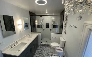 Bathroom overview. Retro and elegant style luxury bathroom remodel by Stately Kitchen and Bath in Lockport, NY.