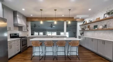 Kitchen overview featuring spacious island with dining.